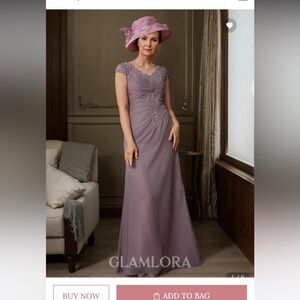 Mother of the bride dress size L .
Lavender never worn